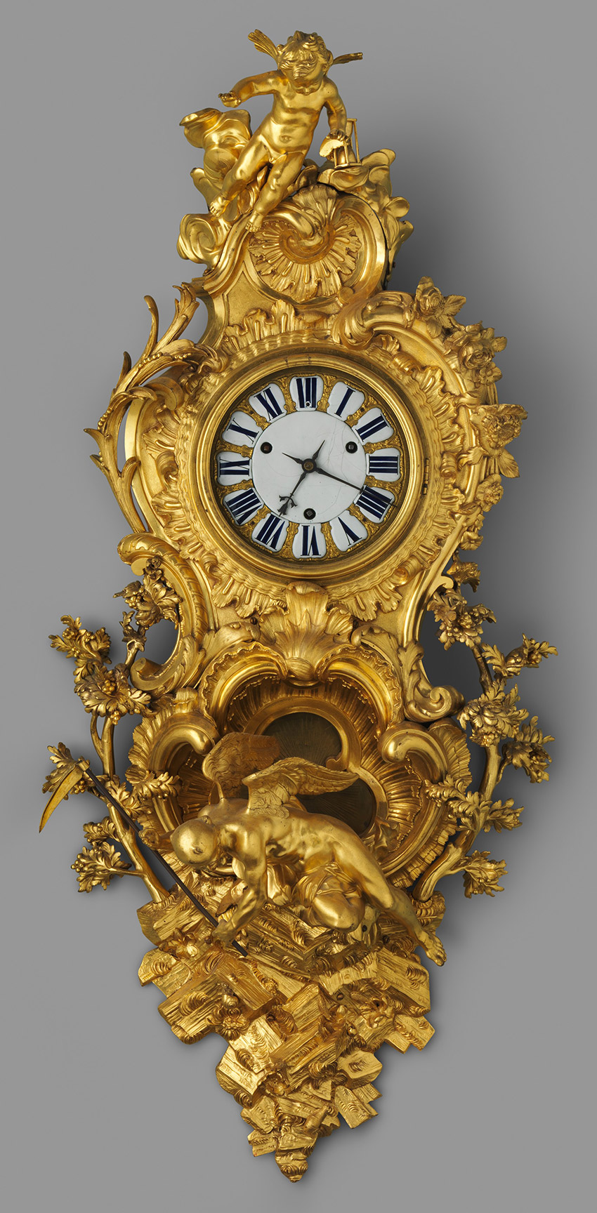 Wall-clock-cartel-by-Charles-Cressent.-1740-1745._Clockmaker_Jean-Godde-laine.-Metropolitan-Museum_850_W.jpg