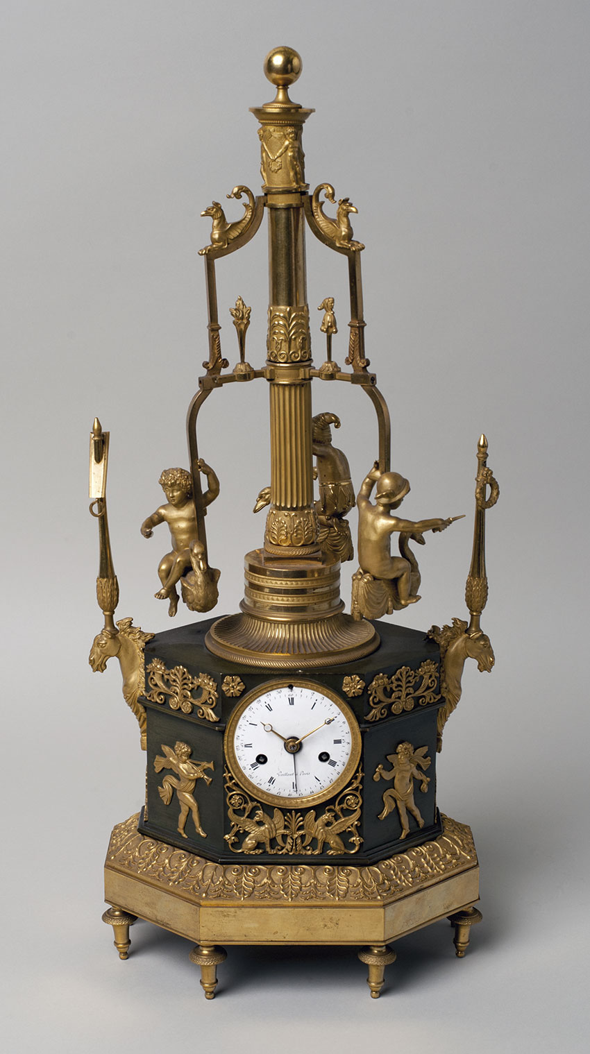 18_Carrusel. Reloj frances de sobremesa automata en bronce dorado por Vaillan. Circa 1805. 54,5 x 23,5 x 18 cm. Nº Inv. R.A. 643