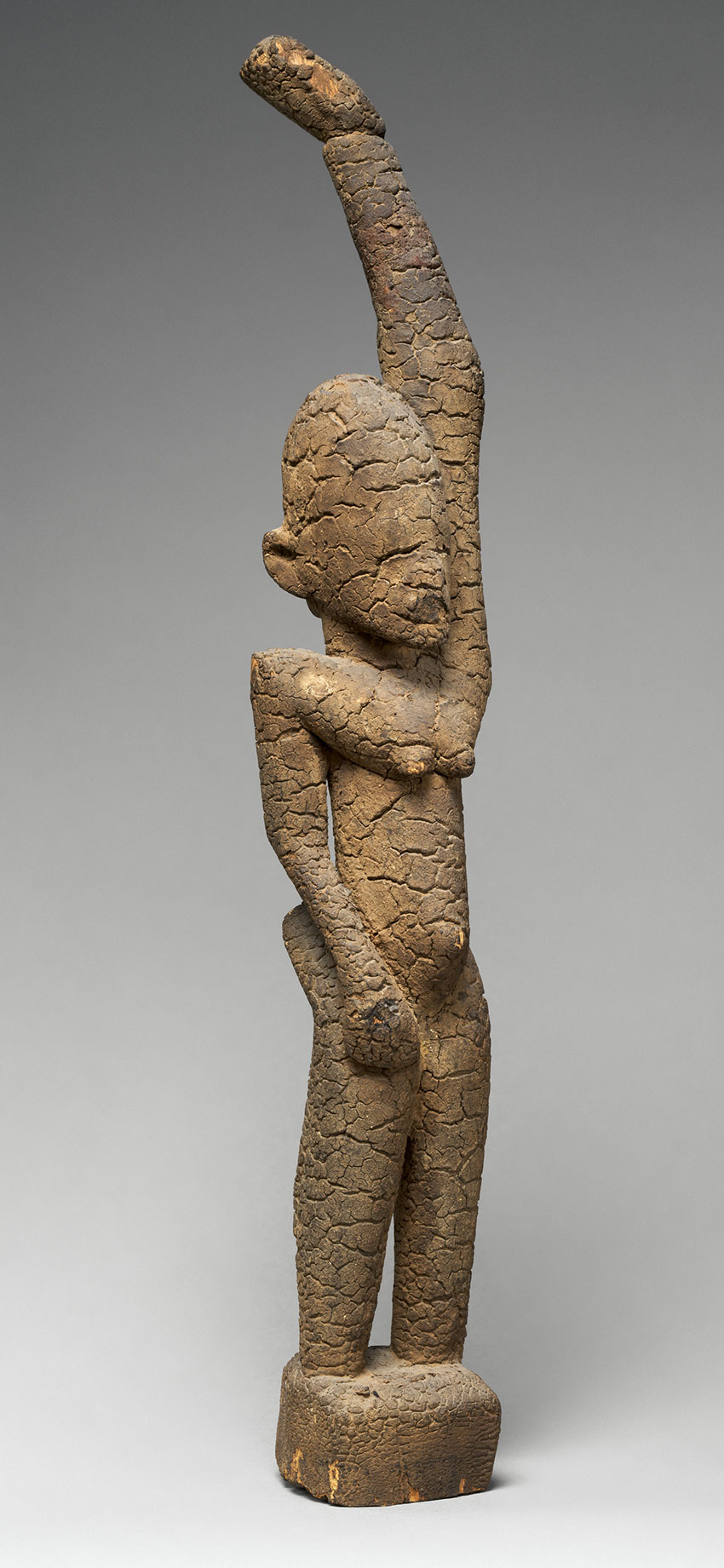 Female-Figure-with-Raised-Arm.-Mali-Ireli_-Tellem-civilization_15th–17th-century-Wood_African-Art.j